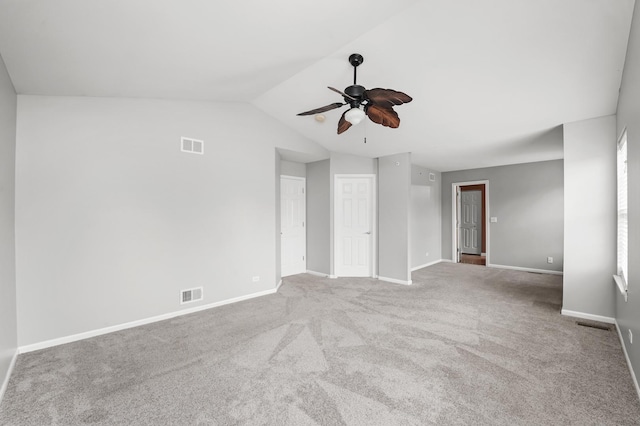 unfurnished room with baseboards, a ceiling fan, and visible vents