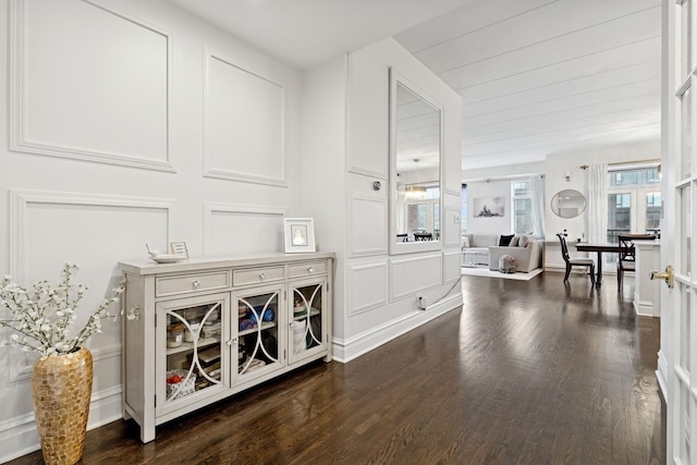 1111 W Madison St Unit 5B, Chicago, IL 60607 - hallway with dark wood finished floors and a decorative wall