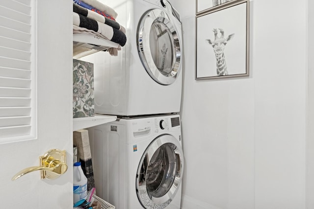 1111 W Madison St Unit 5B, Chicago, IL 60607 - clothes washing area with stacked washer / drying machine and laundry area