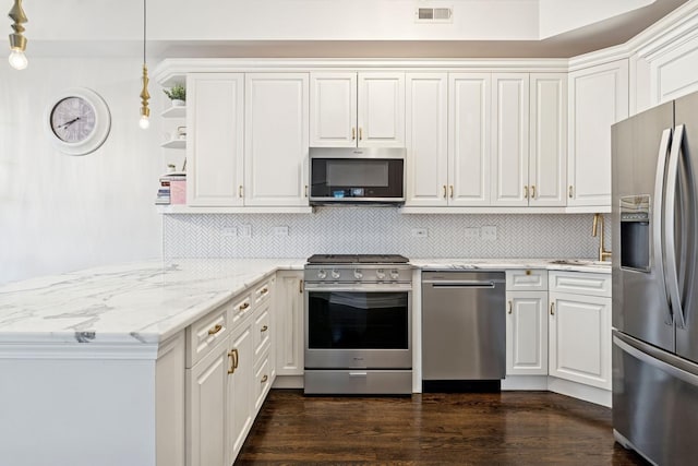 1111 W Madison St Unit 5B, Chicago, IL 60607 - kitchen featuring visible vents, appliances with stainless steel finishes, open shelves, a peninsula, and white cabinetry