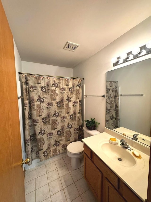 3512 Blue Ridge Ct, Carpentersville, IL 60110 - bathroom with vanity, tile patterned flooring, toilet, and curtained shower