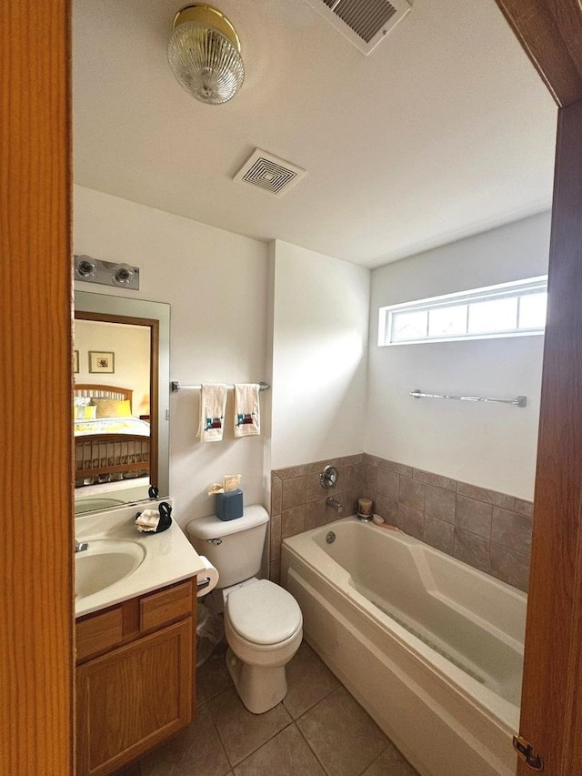 3512 Blue Ridge Ct, Carpentersville, IL 60110 - full bathroom with a bath, tile patterned flooring, vanity, and toilet