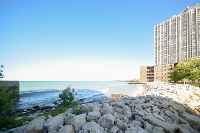 property view of water featuring a beach view