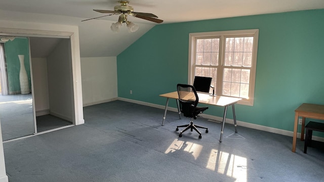 office featuring carpet floors, a ceiling fan, baseboards, and vaulted ceiling