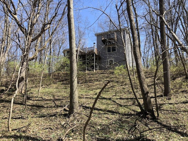 view of yard featuring a wooden deck