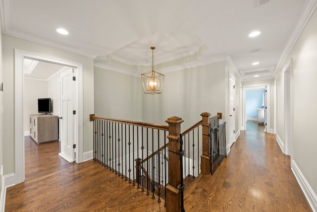 corridor with dark wood-style flooring, baseboards, recessed lighting, a chandelier, and an upstairs landing