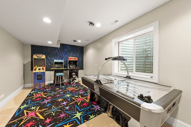 recreation room featuring recessed lighting, baseboards, and visible vents
