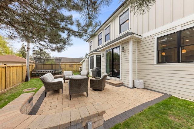 view of patio featuring a fenced backyard and a trampoline