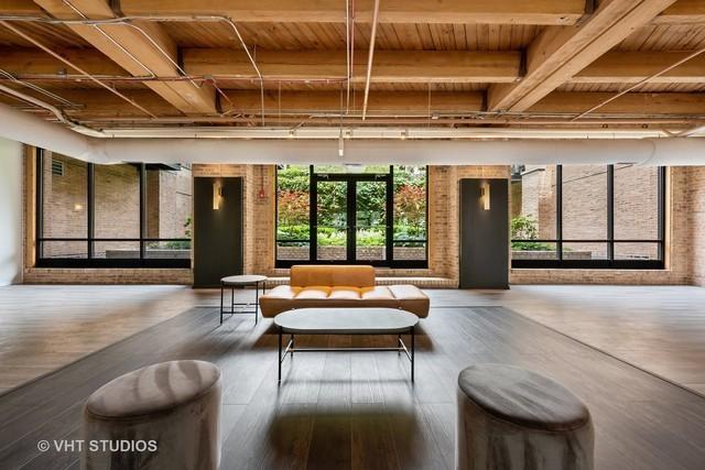 1040 W Adams St Unit 203, Chicago, IL 60607 - common area with wooden ceiling with exposed beams