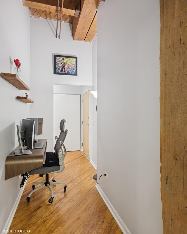 1040 W Adams St Unit 203, Chicago, IL 60607 - office area with light wood-style flooring, baseboards, and a high ceiling