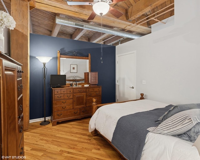 1040 W Adams St Unit 203, Chicago, IL 60607 - bedroom featuring wood ceiling with exposed beams and light wood-style floors