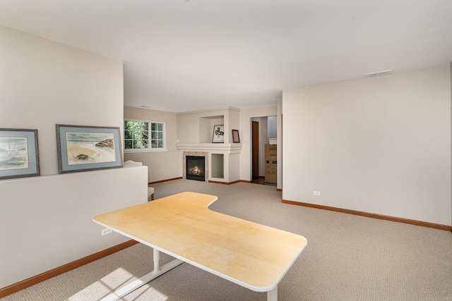 2270 Twilight Dr Unit 2270, Aurora, IL 60503 - unfurnished living room with light carpet, baseboards, and a fireplace