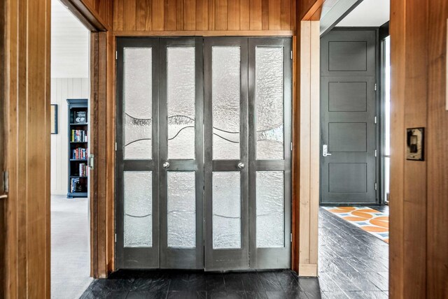221 Parkview Dr, Bloomington, IL 61701 - doorway to outside with wood walls and french doors