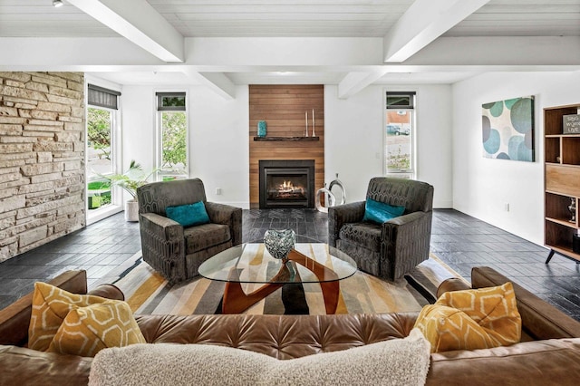 221 Parkview Dr, Bloomington, IL 61701 - living room featuring beamed ceiling, plenty of natural light, and a fireplace