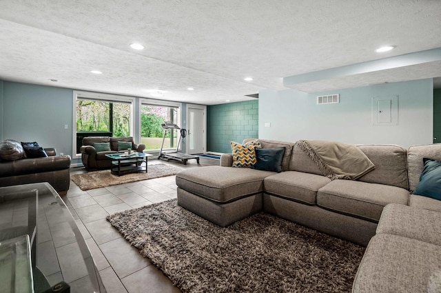 221 Parkview Dr, Bloomington, IL 61701 - living area with a textured ceiling, recessed lighting, and tile patterned floors
