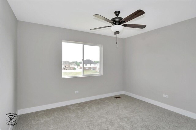 26165 County Fair Dr, Monee, IL 60449 - empty room with baseboards, ceiling fan, carpet, and visible vents