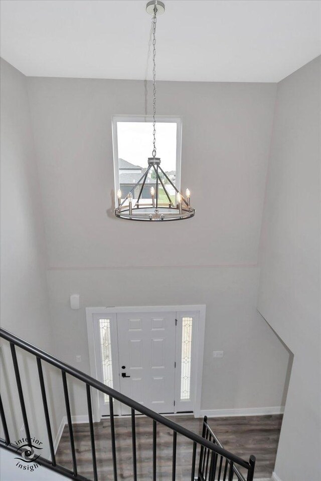 26165 County Fair Dr, Monee, IL 60449 - foyer entrance with stairway, baseboards, wood finished floors, and a notable chandelier