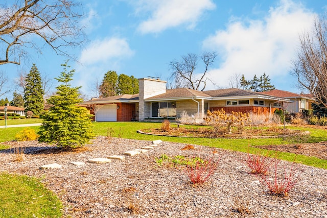 3012 38th St, Oak Brook, IL 60523 - single story home with an attached garage, a chimney, and a front yard