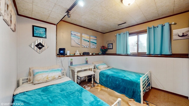carpeted bedroom featuring ornamental molding