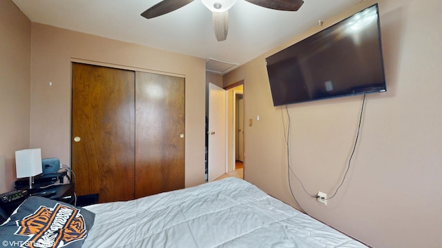 bedroom featuring a ceiling fan and a closet