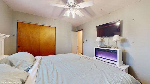 bedroom featuring a closet and ceiling fan