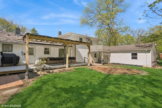 rear view of property with a pergola, an outdoor hangout area, and a lawn