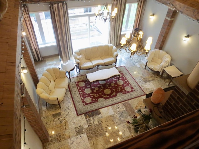 living area featuring a notable chandelier