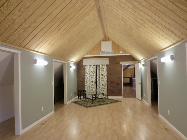 additional living space with vaulted ceiling with beams, baseboards, wood finished floors, and wooden ceiling