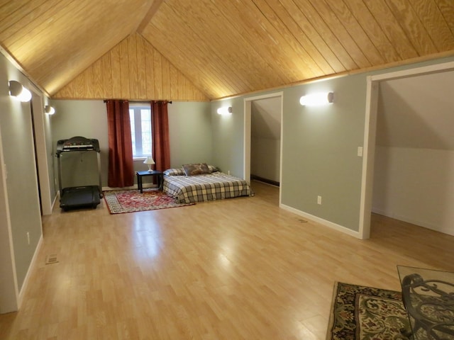 bedroom featuring baseboards, vaulted ceiling, wooden ceiling, and light wood-style flooring