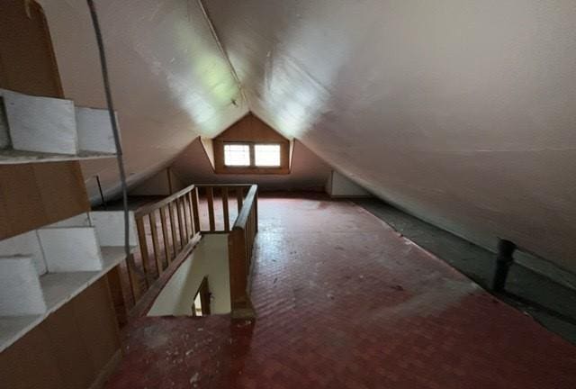 bonus room featuring lofted ceiling
