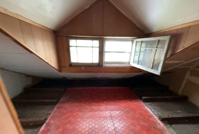 interior space featuring lofted ceiling