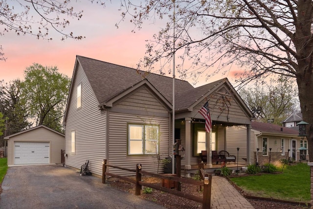 3010 Mary Ln, Mchenry, IL 60051 - view of front of home featuring a shingled roof, a front lawn, aphalt driveway, a detached garage, and an outdoor structure