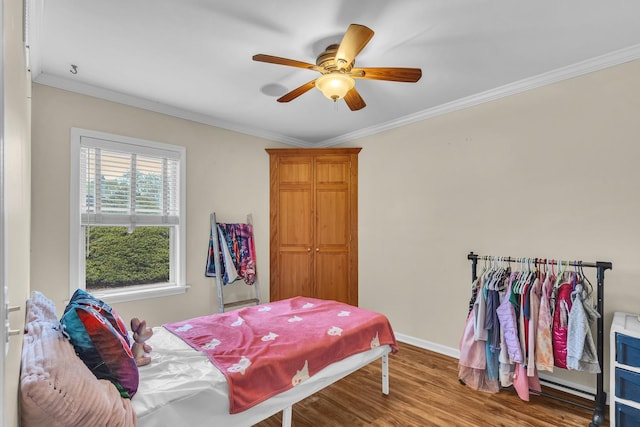 3010 Mary Ln, Mchenry, IL 60051 - bedroom featuring a ceiling fan, baseboards, ornamental molding, and wood finished floors