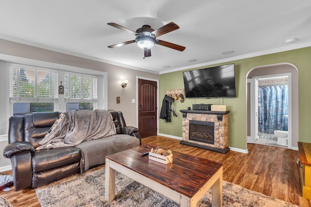 3010 Mary Ln, Mchenry, IL 60051 - living room with ceiling fan, ornamental molding, a stone fireplace, and wood finished floors
