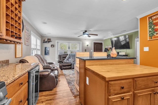 3010 Mary Ln, Mchenry, IL 60051 - kitchen featuring crown molding, light wood-style floors, wine cooler, and open floor plan