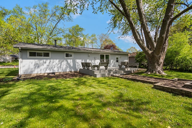 310 S Elm St, Saint Joseph, IL 61873 - rear view of property featuring a lawn and a deck
