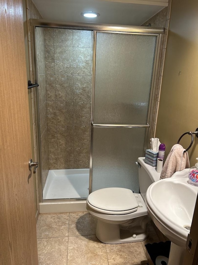 7172 W Armitage Ave, Chicago, IL 60707 - full bathroom featuring toilet, a shower stall, and tile patterned flooring