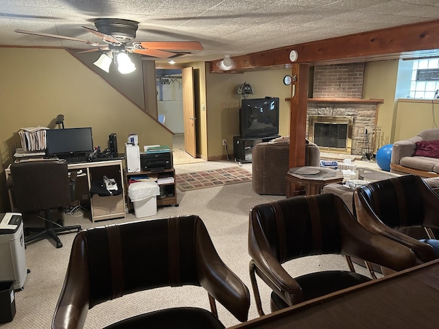 7172 W Armitage Ave, Chicago, IL 60707 - living room with a stone fireplace, a ceiling fan, and carpet