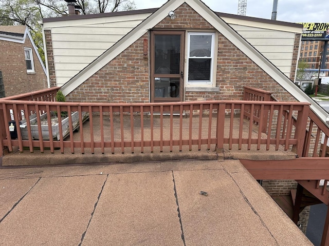 7172 W Armitage Ave, Chicago, IL 60707 - exterior space featuring brick siding, stairs, and a chimney