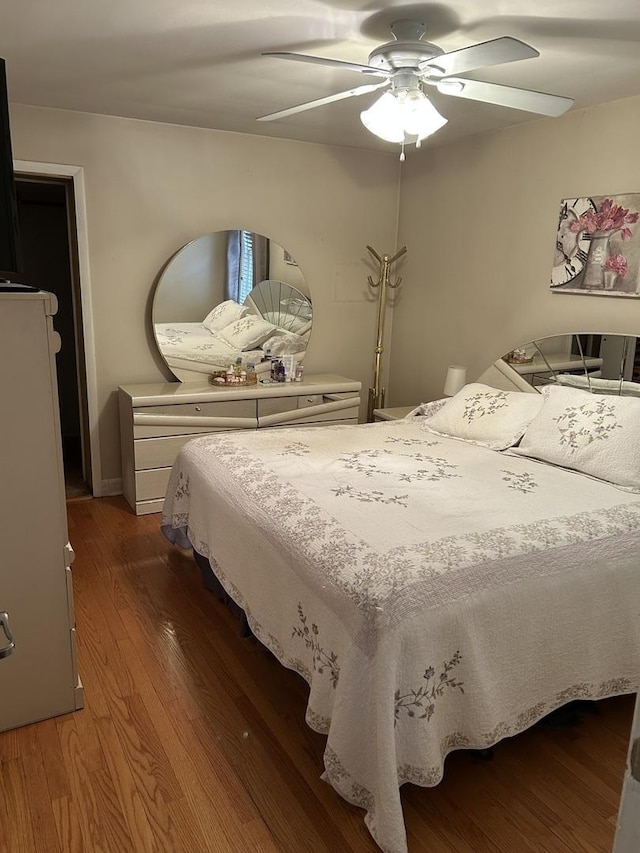 7172 W Armitage Ave, Chicago, IL 60707 - bedroom featuring ceiling fan and wood finished floors