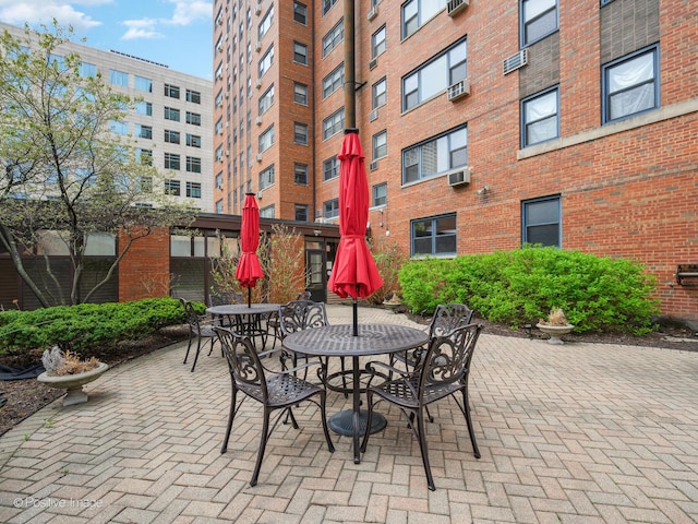 view of patio featuring outdoor dining space