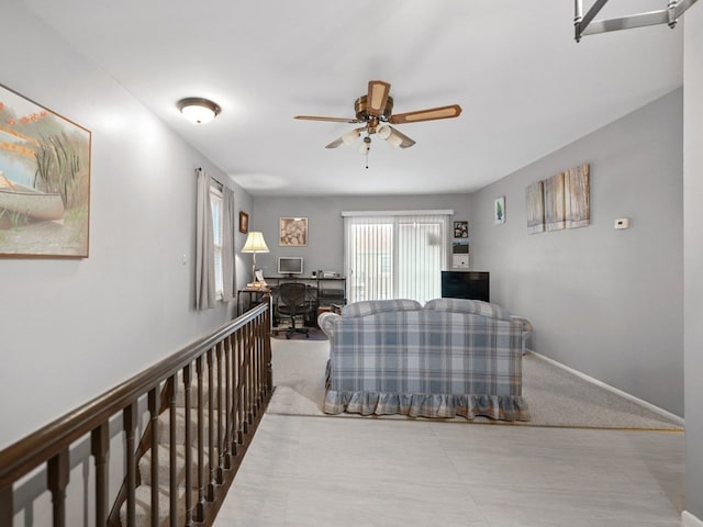 121 Foxhill Ct Unit D, New Lenox, IL 60451 - living area featuring baseboards and a ceiling fan