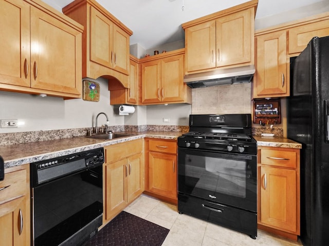 121 Foxhill Ct Unit D, New Lenox, IL 60451 - kitchen with light brown cabinetry, light tile patterned flooring, under cabinet range hood, a sink, and black appliances