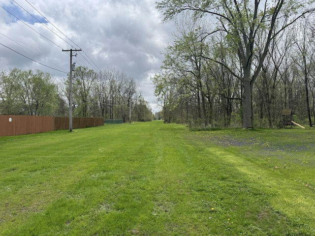 view of yard with fence