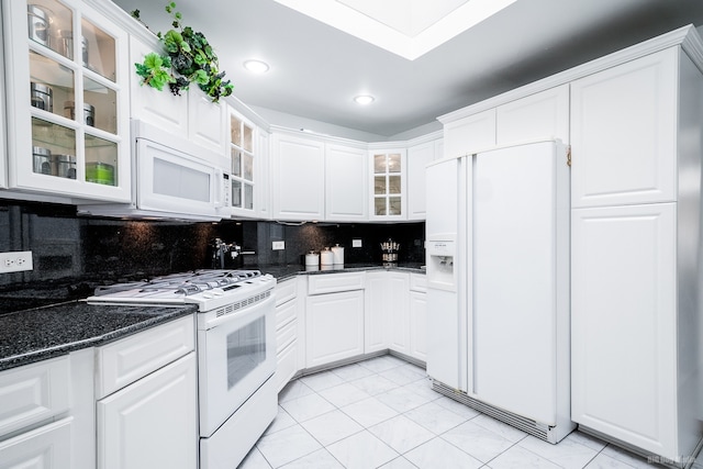 14650 Lamon Ave, Midlothian, IL 60445 - kitchen featuring decorative backsplash, white appliances, glass insert cabinets, white cabinets, and light tile patterned floors