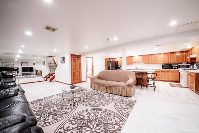 14650 Lamon Ave, Midlothian, IL 60445 - living room with visible vents, recessed lighting, and stairs