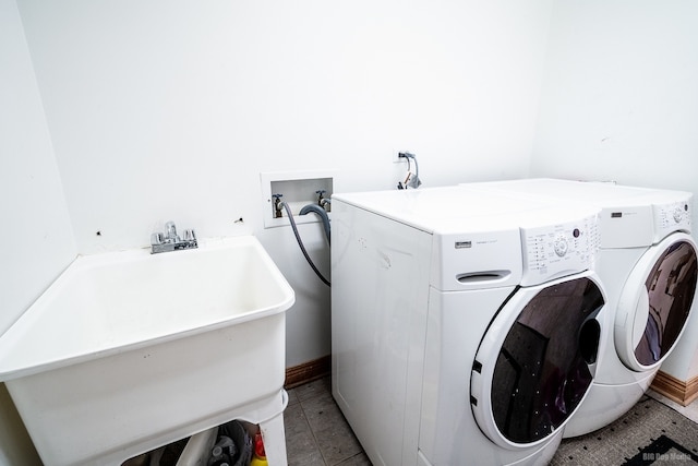 14650 Lamon Ave, Midlothian, IL 60445 - washroom featuring laundry area, a sink, light tile patterned floors, and washing machine and clothes dryer