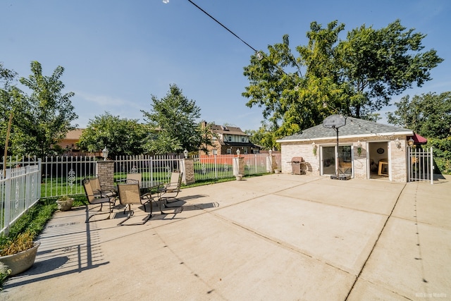 14650 Lamon Ave, Midlothian, IL 60445 - view of patio with fence and an outbuilding