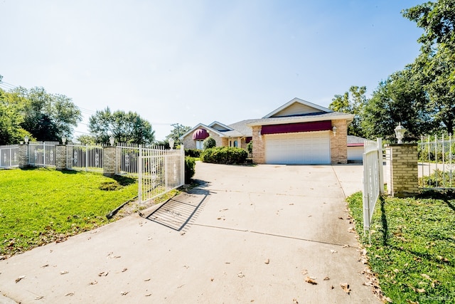 14650 Lamon Ave, Midlothian, IL 60445 - view of front of property featuring a front lawn, fence, brick siding, concrete driveway, and an attached garage