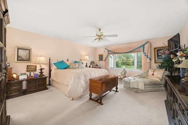 bedroom featuring ceiling fan and carpet floors